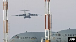 U.S. cargo planes on the runway of the Manas air base