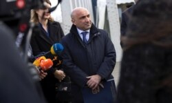 Гюндуз Мамедов после участия в первом заседании суда над обвиняемыми в убийстве в связи с падением рейса МН17, 9 марта 202 года.