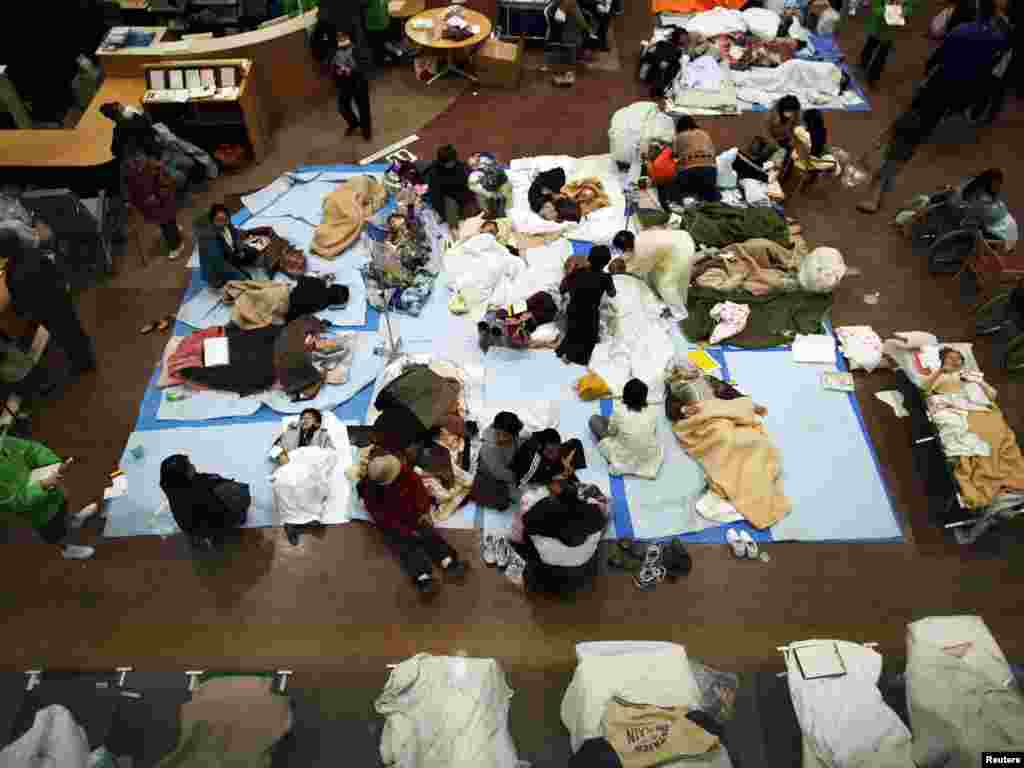 People in the city of Ishinomaki are given first aid at a Red Cross hospital on March 13 after being evacuated