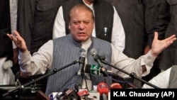 Former Pakistani Prime Minister Nawaz Sharif addresses his party supporters in the eastern Pakistani city of Lahore on October 4.