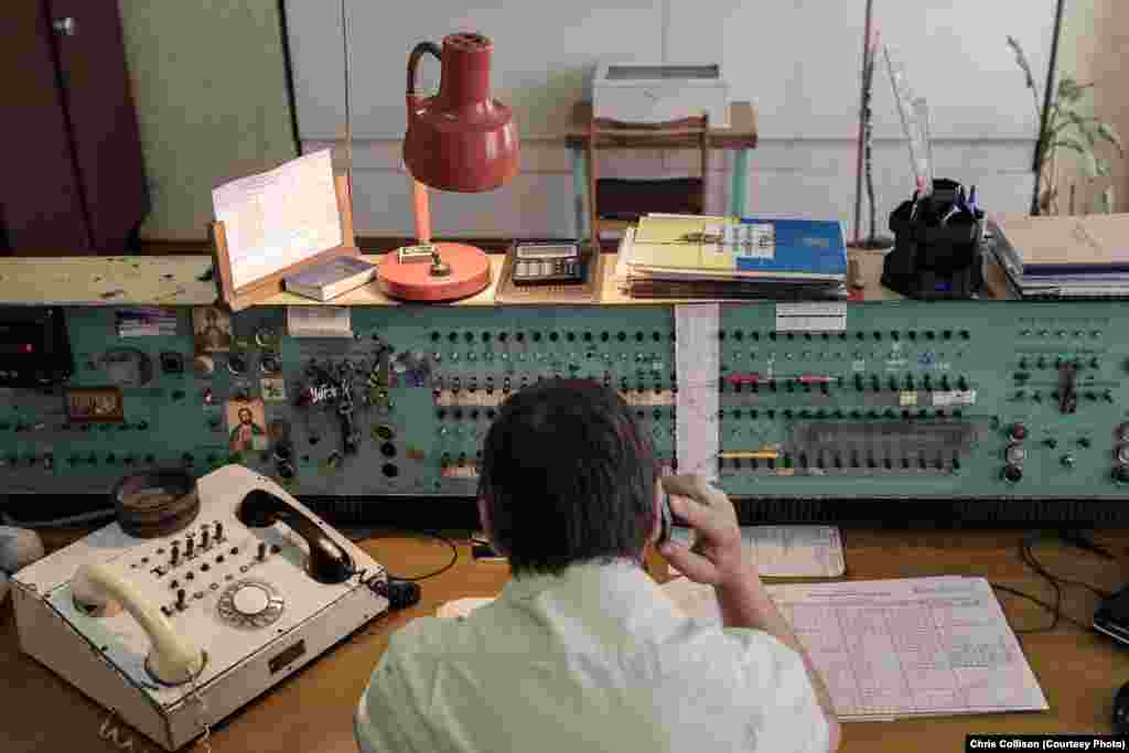 An administrator answers a call in the control room of the Ukraina mine. Director Mirumian says: &quot;People here either work in the mine or in the production factory. There is nowhere else to work. This is a very important moment politically. Under no circumstances should this enterprise close. It would be a catastrophe.&rdquo;