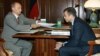 Russian President Vladimir Putin (left) holds a meeting with then-Chukotka Governor Roman Abramovich in 2005.