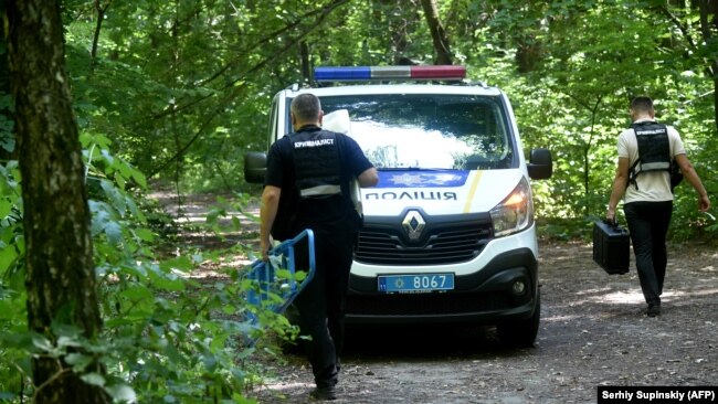 Украинская полиция на месте, где было найдено тело Виталия Шишова