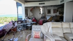 A damaged apartment in a residential building in Muharraq, Bahrain that the country's Interior Ministry says was hit by an Iranian drone on June 28.