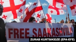 United National Movement supporters protest the arrest of the former Georgian President Mikheil Saakashvili in front of the prison in Rustavi on October 4.