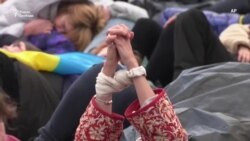 Многолюдные акции в память об убитых в Буче