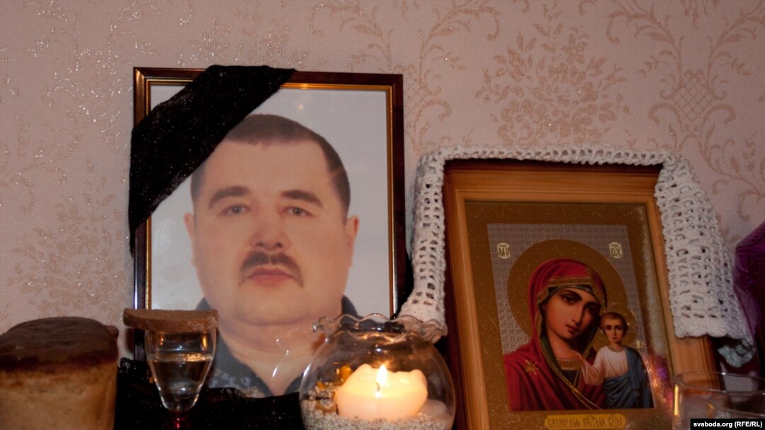 A photo of Henadz Kozyur, one of 14 workers who died in the October explosion at the plant, at his family home.