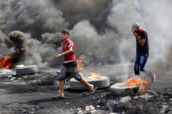 Pamje nga një protestë e mbajtur në Irak.