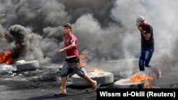 Pamje nga protestat në Irak.