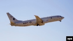 Australia -- A US Navy Boeing P-8 Poseidon takes off from Perth International airport to take part in the search trying to locate missing Malaysia Airways Flight MH370, in Perth, April 15, 2015