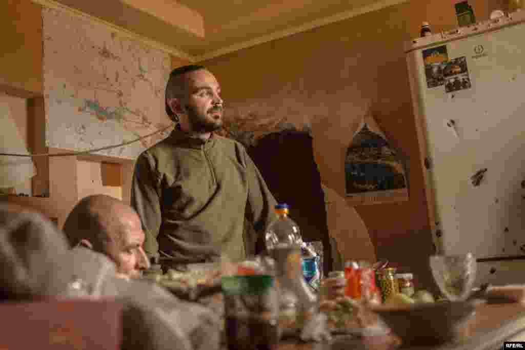 A soldier who goes by the nom de guerre &quot;Nestor&quot; stands in the kitchen. A native of Russia, Nestor&#39;s decision to fight on the Ukrainian&nbsp;side may be unusual, but is not unheard of.