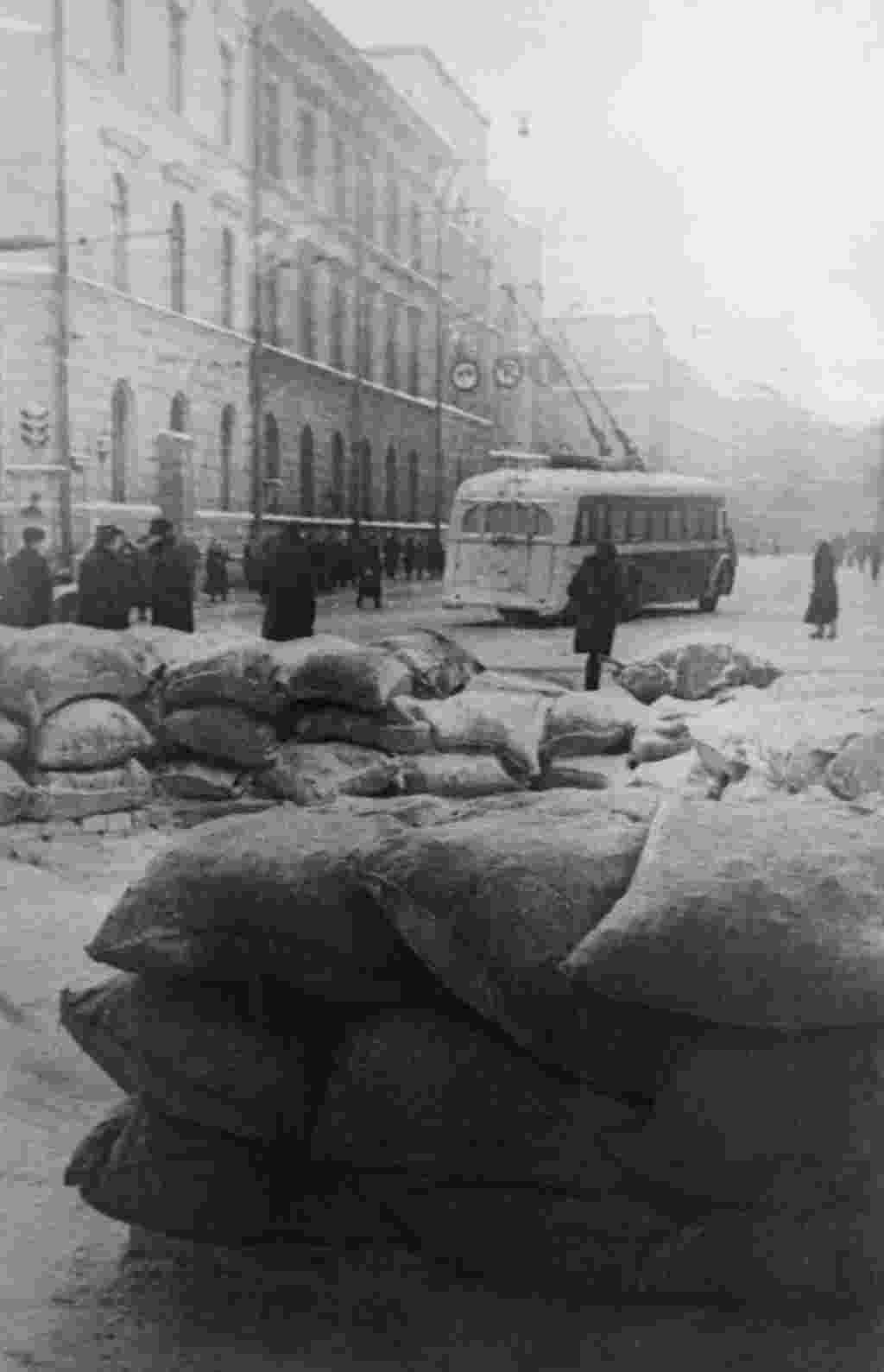 A trolleybus drives past barricades at the Kirov Gate in Moscow, in November 1941.