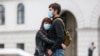 UKRAINE -- Сoronavirus Quarantine. A young couple on Independence Square during the Covid-19 pandemic, Kyiv, May 24,2020
