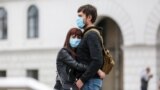 UKRAINE -- Сoronavirus Quarantine. A young couple on Independence Square during the Covid-19 pandemic, Kyiv, May 24,2020