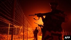 Indian border forces patrol along a fence at an outpost near the disputed India-Pakistan in Kashmir. (file photo)