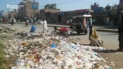 Garbage Piles Up In Pakistani Town As Collectors Strike