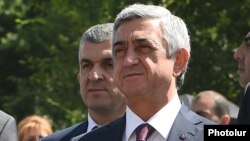 Armenia - President Serzh Sarkisian and his chief bodyguard Vachagan Ghazarian (L), 11 July 2015.