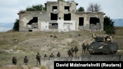 GEORGIA -- U.S. servicemen attend a drill during the multinational military exercises "Noble Partner 2018" at Vaziani military base outside Tbilisi, August 6, 2018