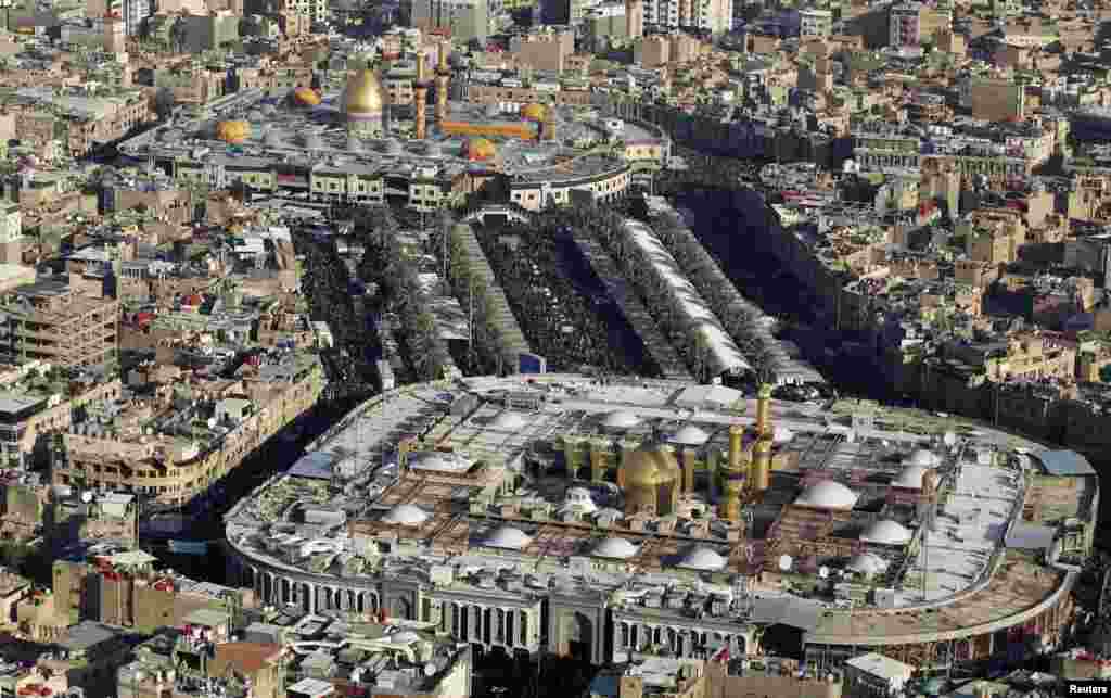 An aerial view shows the shrines of Imam al-Abbas and Imam al-Hussein during the religious ceremony of Arbain in Karbala on January 2, 2013. (Reuters/Muhammad Amin)