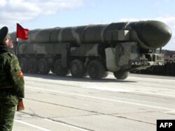 A Topol-M intercontinental ballistic missile is prepared at a rehearsal for the Victory Day parade outside Moscow in 2008.