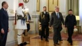 Ukrainian President Volodymyr Zelenskyy meets with Greek President Constantine Tassoulas at the presidential palace in Athens on November 16.