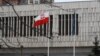 The Polish flag flies by Warsaw's embassy in Moscow. (file photo)