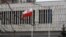 The Polish flag flies by Warsaw's embassy in Moscow. (file photo)