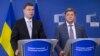 European Commission Vice President Valdis Dombrovskis (left) and Ukraine's Finance Minister Oleksandr Danyliuk in Brussels in September