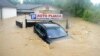 Наводнение продолжает наносить огромный материальный ущерб. Селение Обреновац, Сербия, 16 мая 2014 г. 