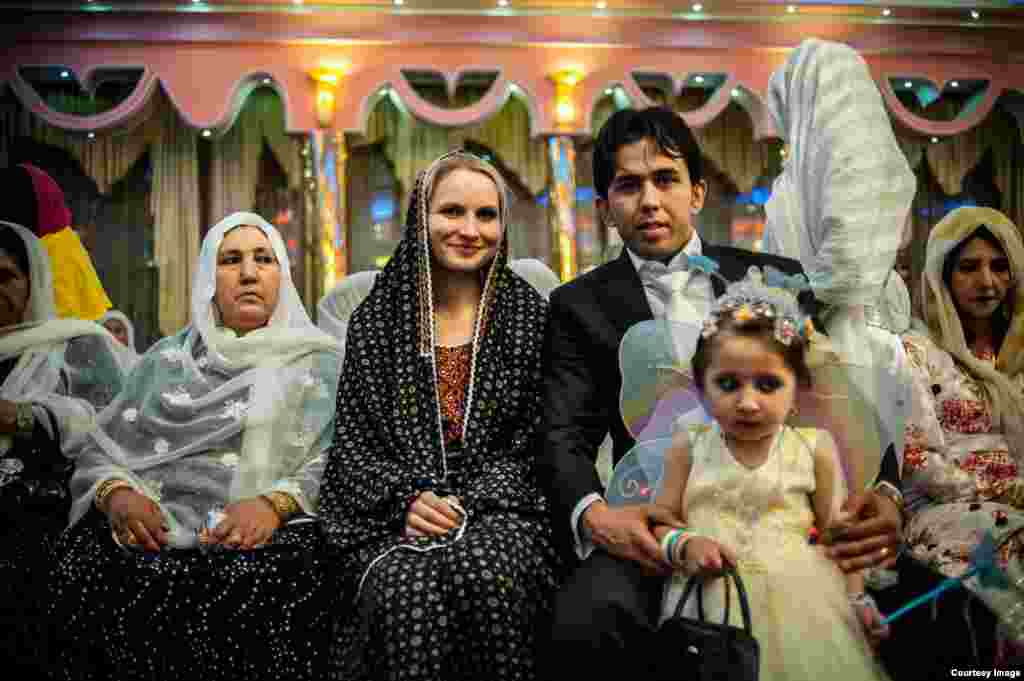 With the happy couple in Afghanistan.