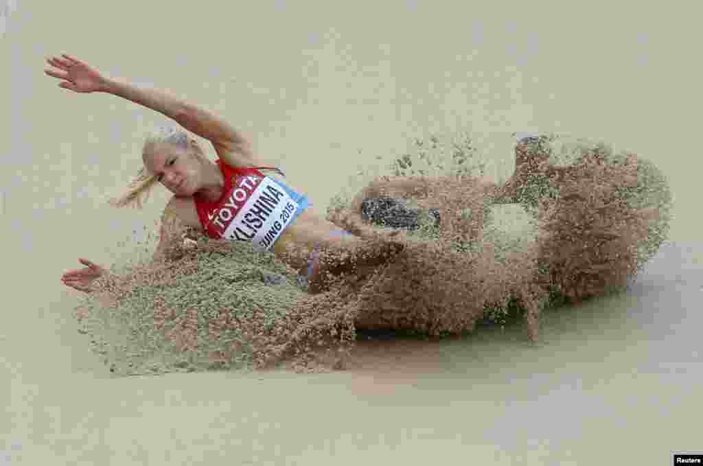 Darya Klishina of Russia competes in the women&#39;s long jump qualifying round during the 15th IAAF World Championships at the National Stadium in Beijing, China. (Reuters/Dylan Martinez)