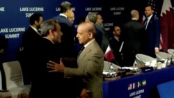 Pakistani Prime Minister Shehbaz Sharif (right) welcomes Iranian Foreign Minister Abbas Araqchi, as US Vice President JD Vance stands in the background, before the start of peace talks in Switzerland on June 21. 