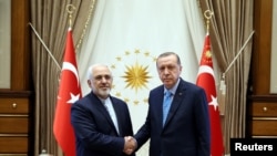 File Photo Turkey - Turkish President Tayyip Erdogan meets with Iranian Foreign Minister Mohammad Javad Zarif in Ankara, Turkey, May 7, 2017. 