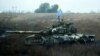 Украінскі сьцяг на захопленым расейскім танку