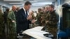 NATO Secretary-General Mark Rutte (L) inspects a Lockheed Martin Sentinel reconnaissance drone at the German-Netherlands Corps in Muenster on October 1.