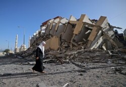 Рухнувший после израильского удара жилой дом в Газе