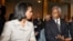 Condoleezza Rice (left) talks to Kofi Annan before the meeting in Rome on July 26