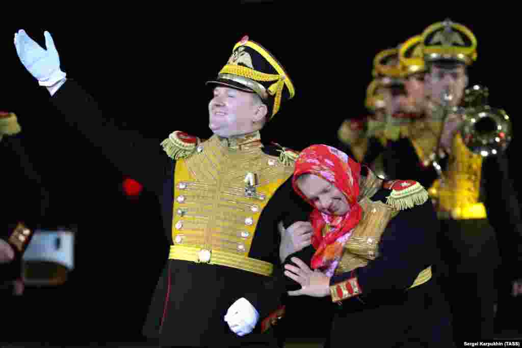 Participants perform during the Spasskaya Tower International Military Music Festival on Red Square in Moscow.