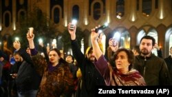 Demonstrators gather at the Georgian parliament building in Tbilisi on the evening of November 14. 