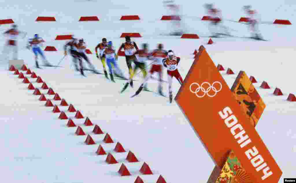 Norway&#39;s Magnus Krog (front) competes during the cross-country race of the nordic-combined individual event.