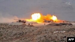 Lebanon -- An artillery fires towards militant jihadists' position in Jurud Arsal, a mountainous region bordering with Syria, July 21, 2017