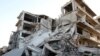 Руины в городе Алеппо, обстановка в котором резко ухудшилась после срыва перемирия