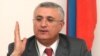 Armenia - Garegin Azarian, chairman of the Central Election Commission.