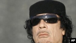 Муаммар Қаддафий.