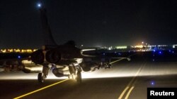 French fighter jets launched their biggest raids in Syria to date targeting the Islamic State's stronghold in Raqqa, November 15, 2015.