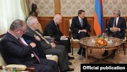 Armenia - President Serzh Sarkisian (R) meets with the U.S., French and Russian co-chairs of the OSCE Minsk Group in Yervan, 14May2012.