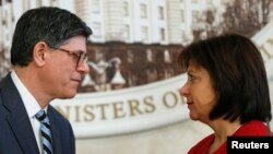 Ukrainian Finance Minister Natalia Yaresko (right) and U..S Treasury Secretary Jack Lew during a joint news conference in Kyiv on January 28.