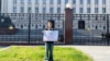 A protester outside the Russian Defense Ministry in Moscow on September 22 with a sign reading: "Return my dad. I've been waiting two years."