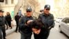 Azerbaijan -- police detain opposition activist Gozal Bayramli during a protest in downtown Baku, 17Apr2011