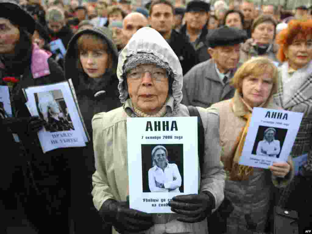 Activists at a rally in honor of Politkovskaya in Moscow in 2009